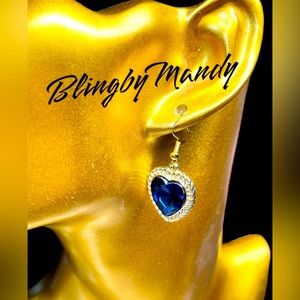 Deep blue crystal encased in gold  earrings -sterling